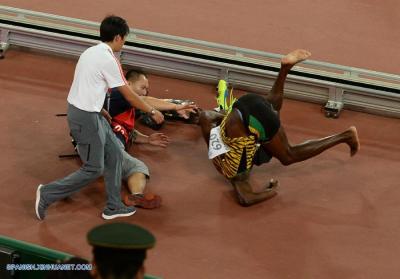 Usain Bolt tras su accidente con un camarógrafo